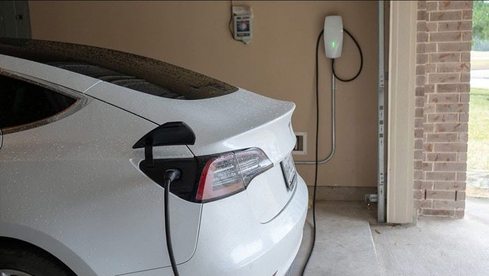 Tesla EV charger installed in a home garage by TK Electric