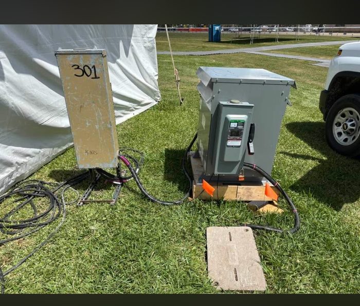 Temporary power pole and panel set up for an outdoor event by TK Electric